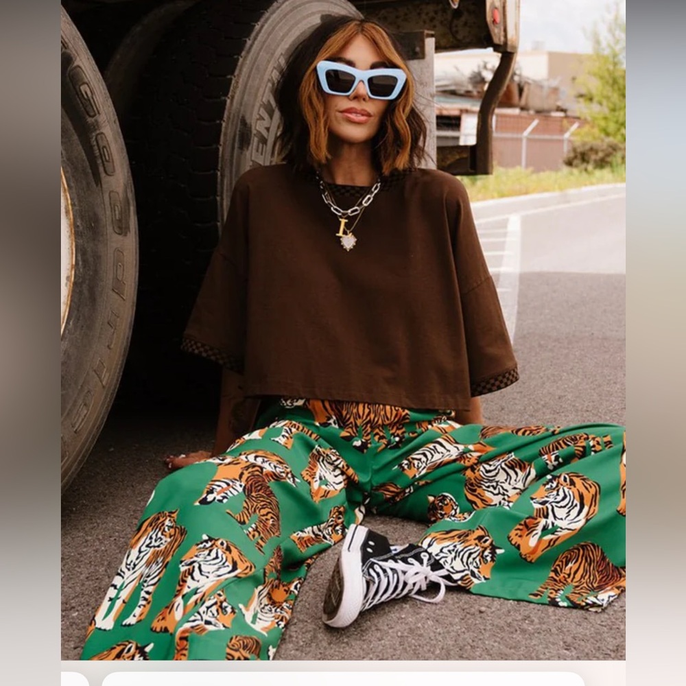 Dressed in Lala Frankie’s cropped tee